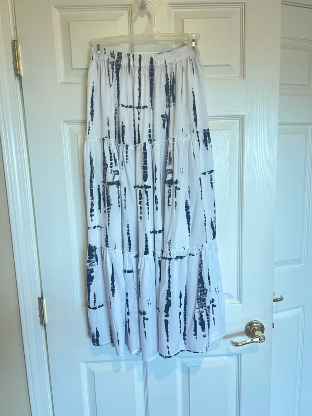 Womens White Tiered Maxi Skirt with Black Abstract Print comfortable for travel.